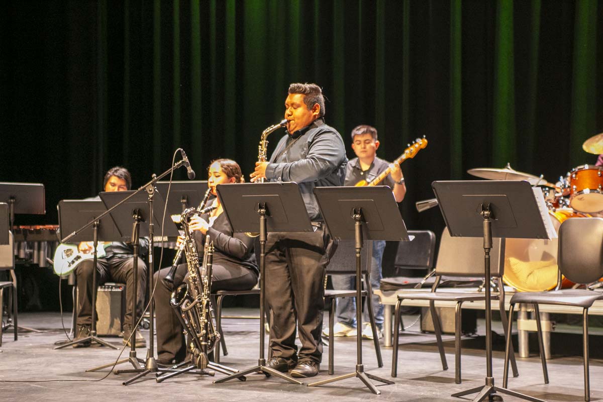 Student playing saxaphone at jazz concert