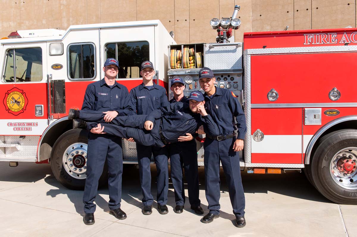 five cadets posing for a silly photo