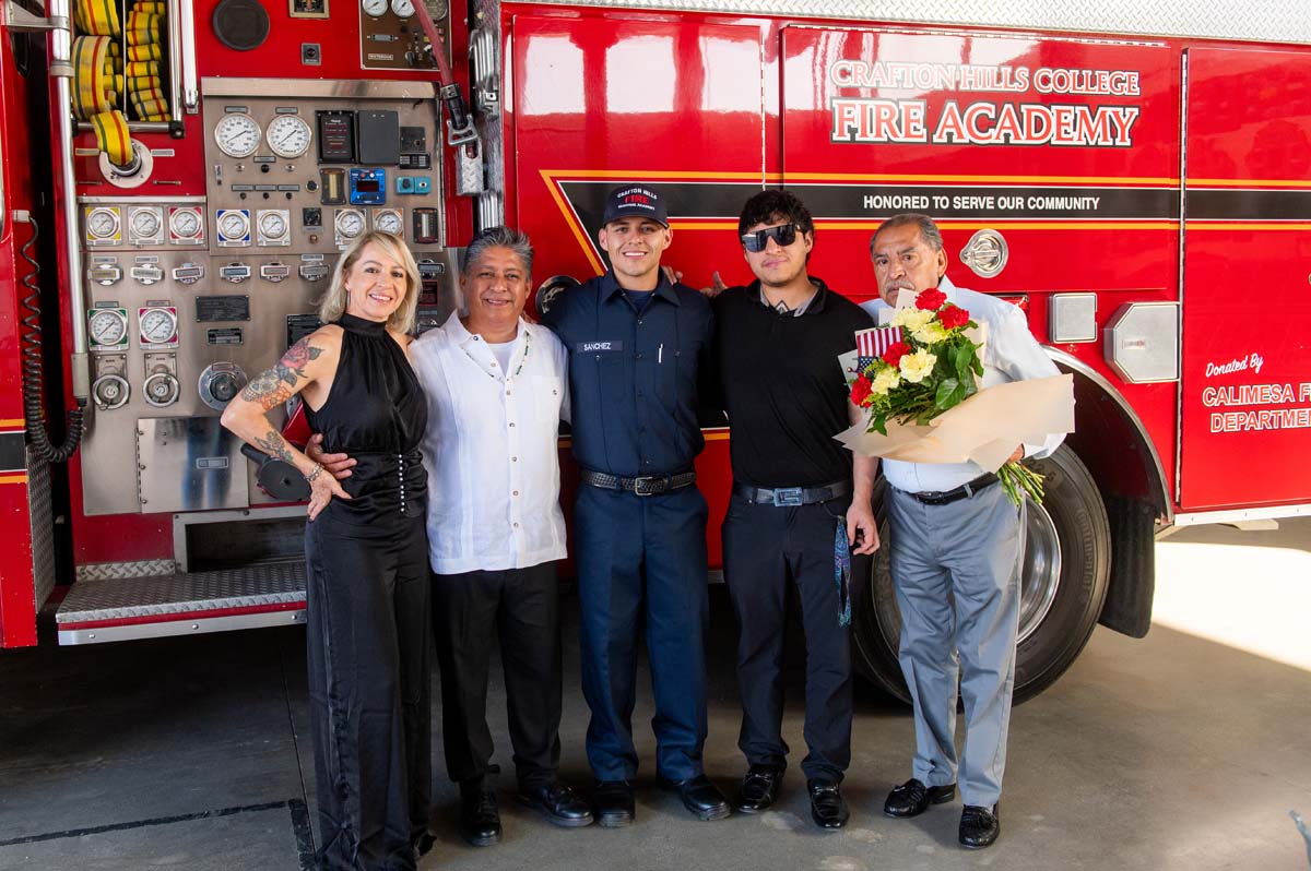Cadet posing with his family