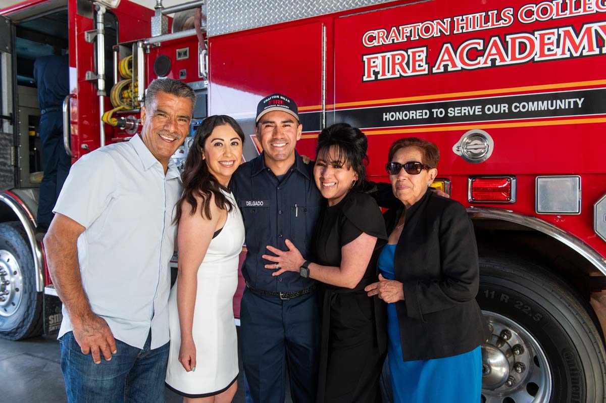 Cadet posing with his family