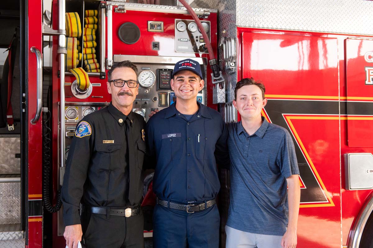 Cadet posing with his family