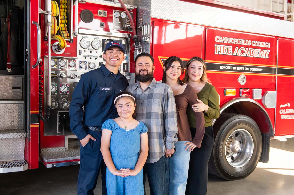 Cadet posing with his family