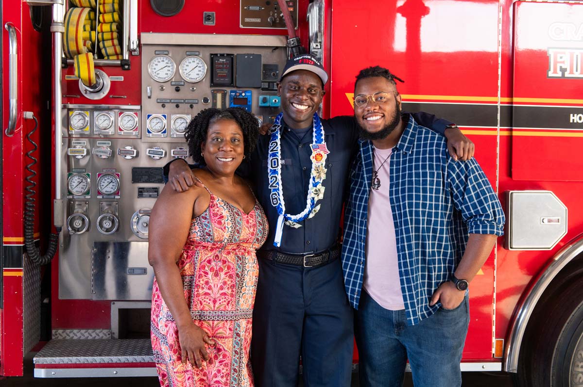 Cadet posing with his family