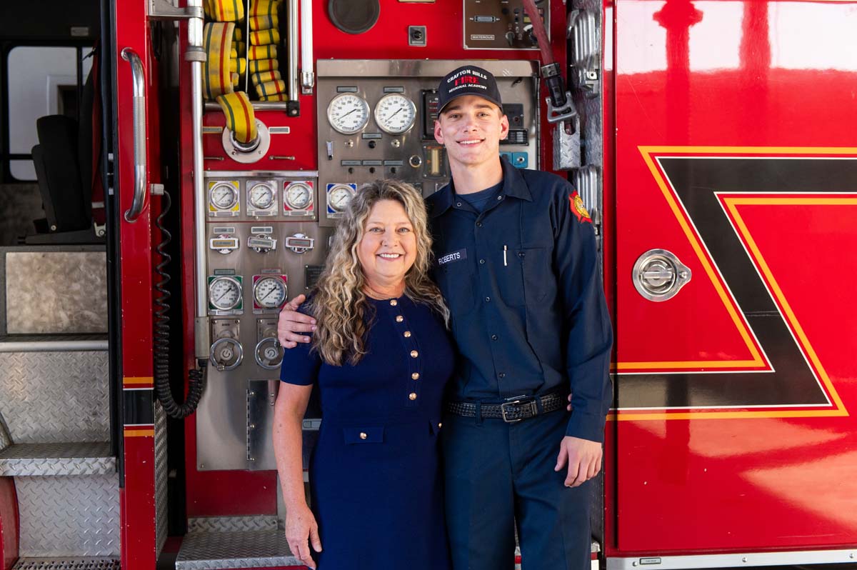 Cadet posing with his family