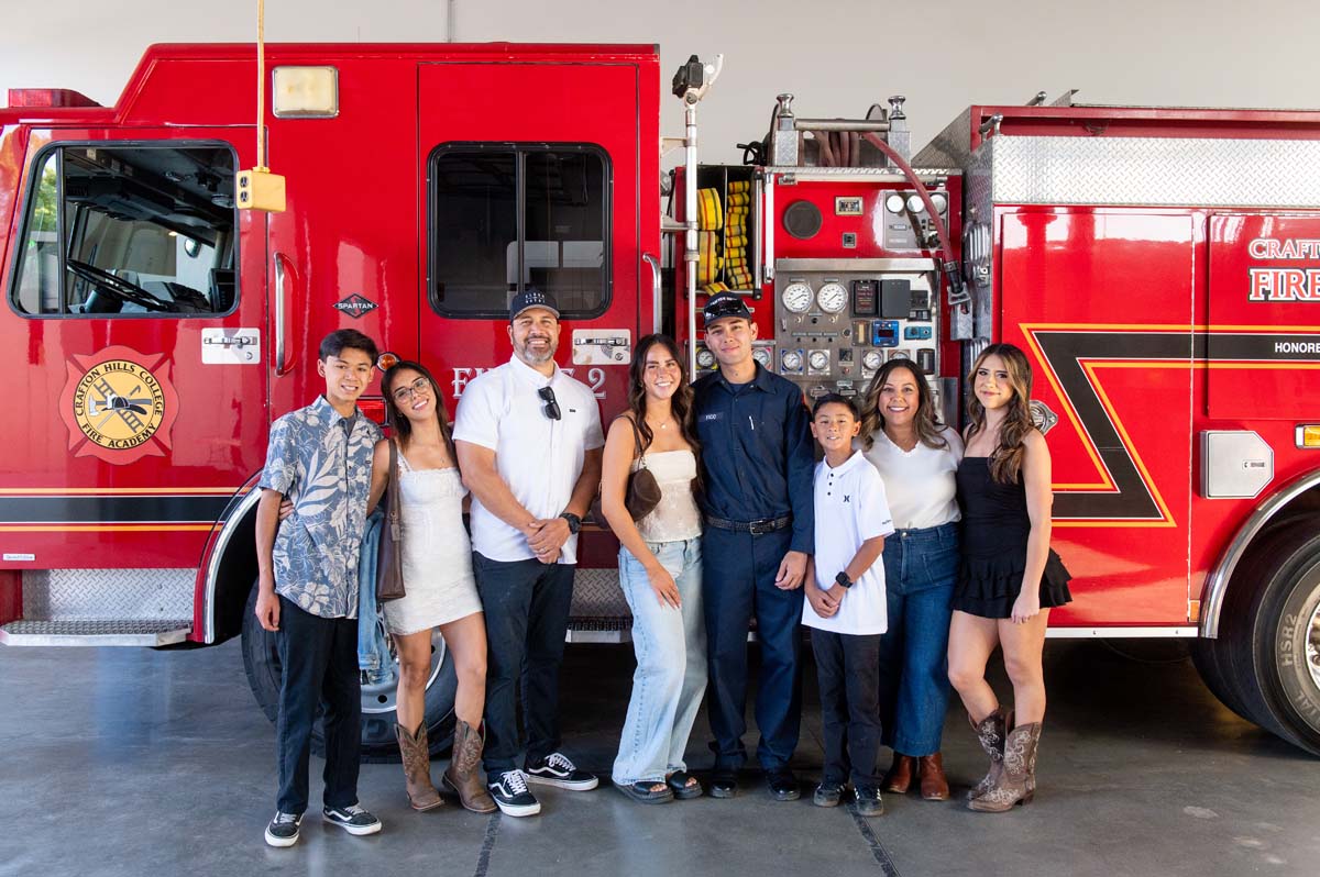 Cadet posing with his family