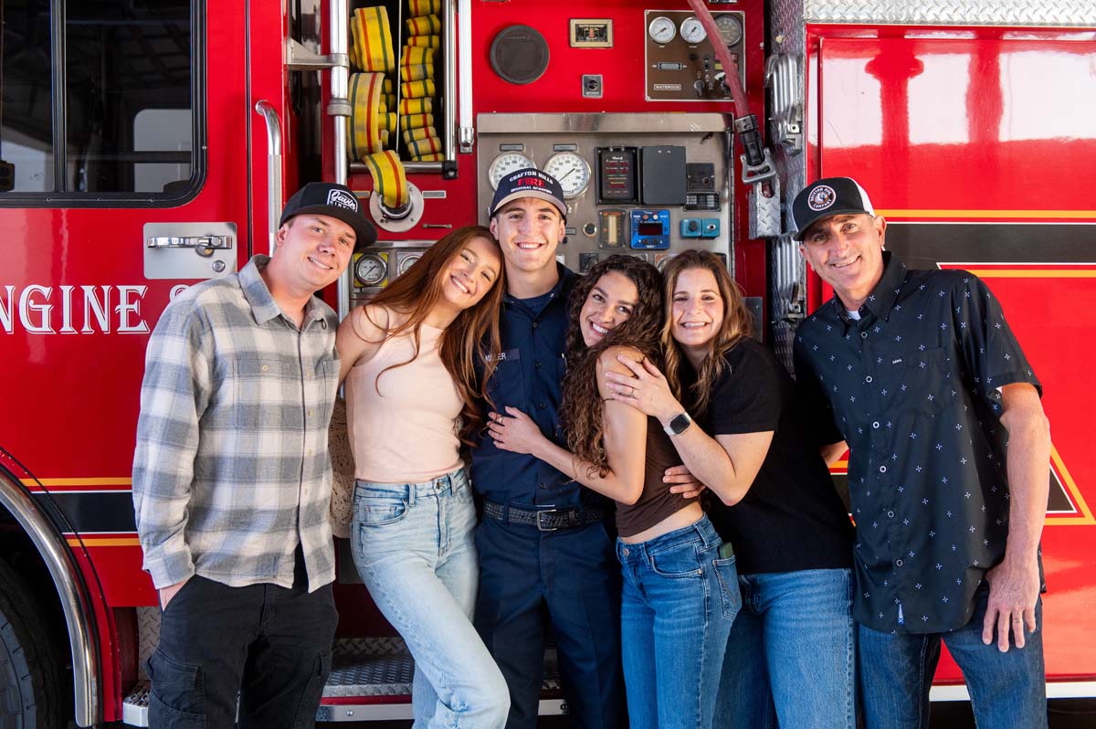 Cadet posing with his family