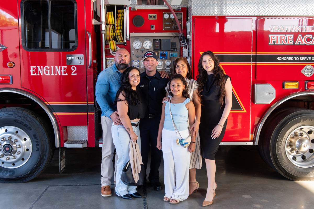 Cadet posing with his family