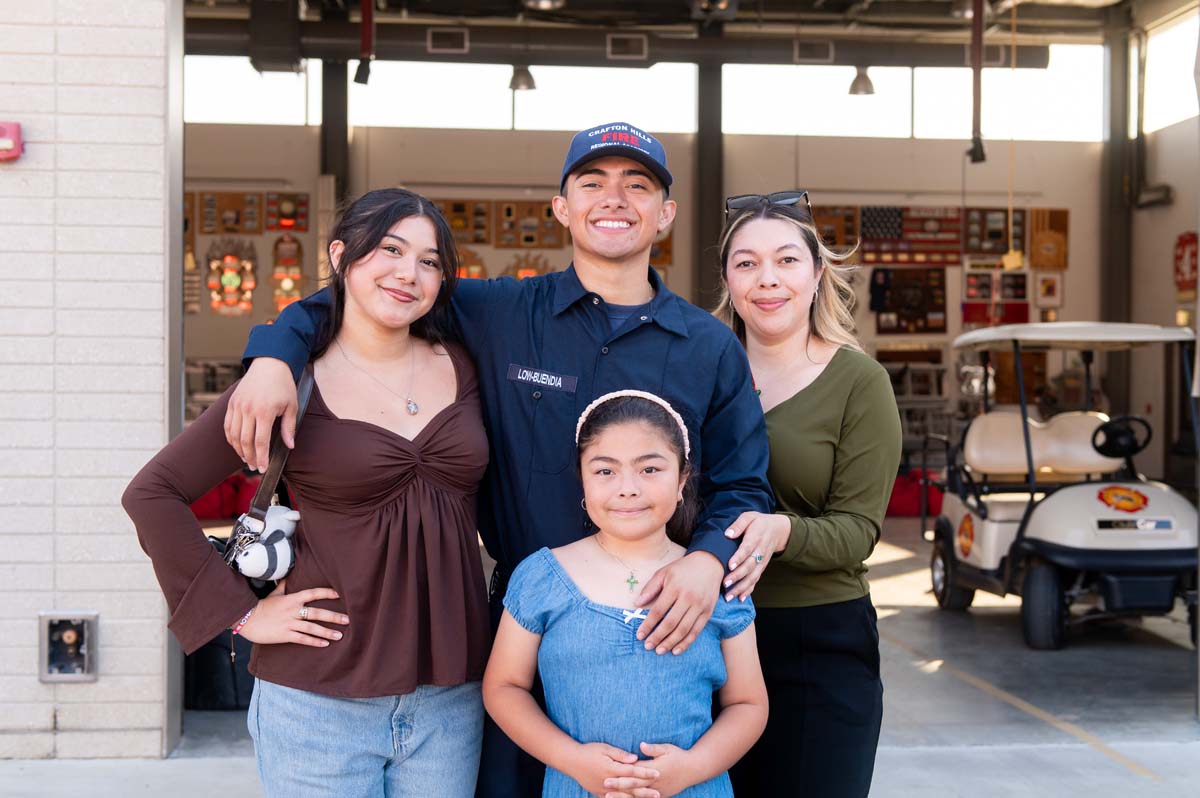 Cadet posing with his family