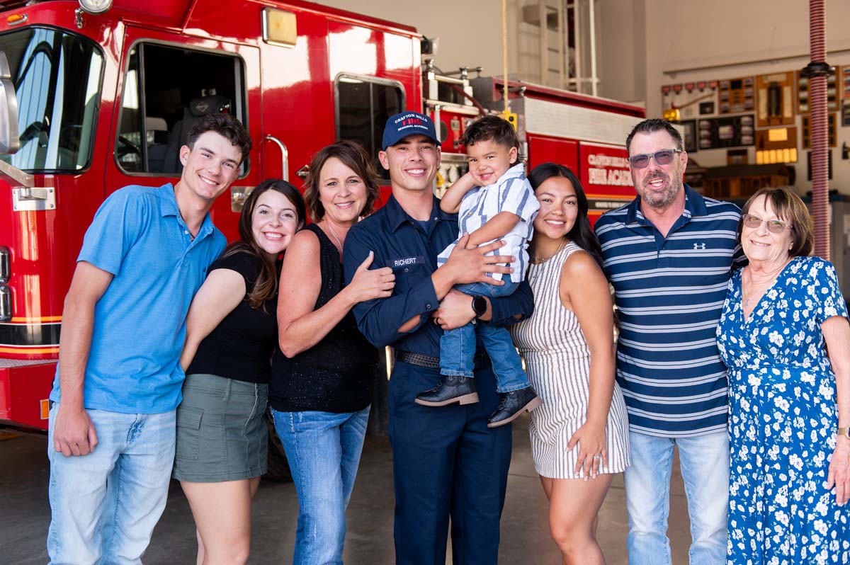 Cadet posing with his family