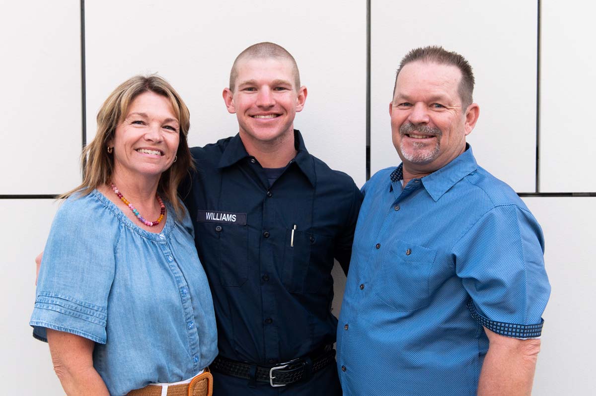 Cadet taking family photo after ceremony