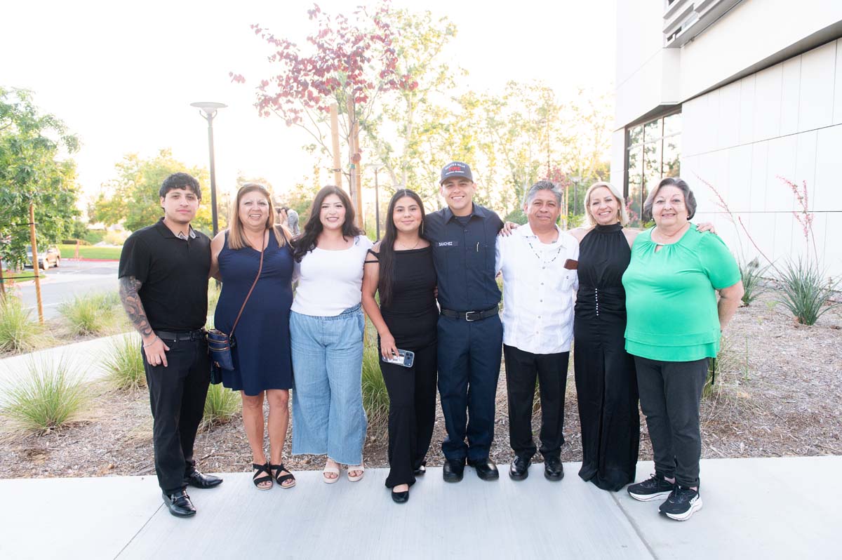 Cadet taking family photo after ceremony