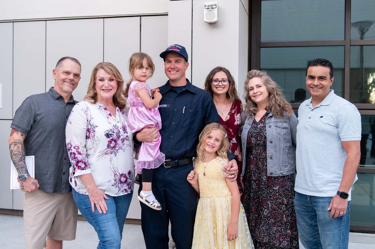 Cadet taking family photo after ceremony
