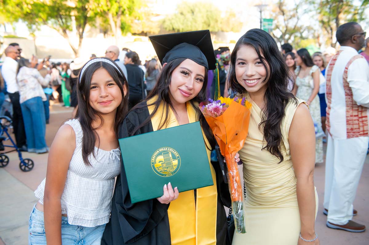 Grad with their family
