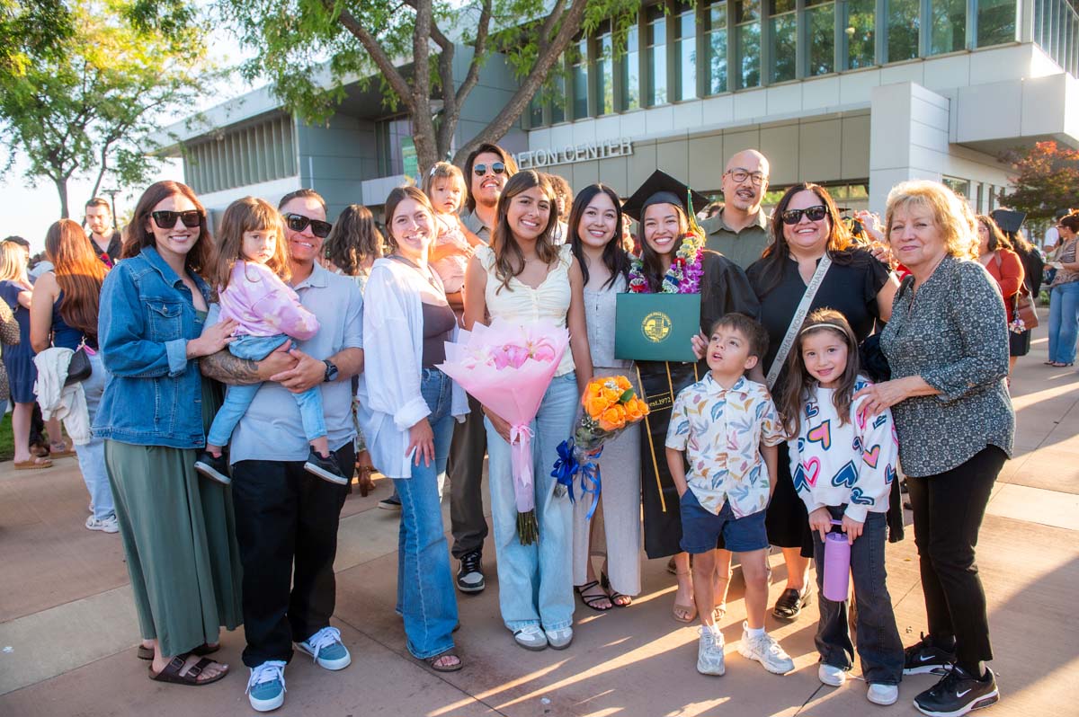 Grad with their family