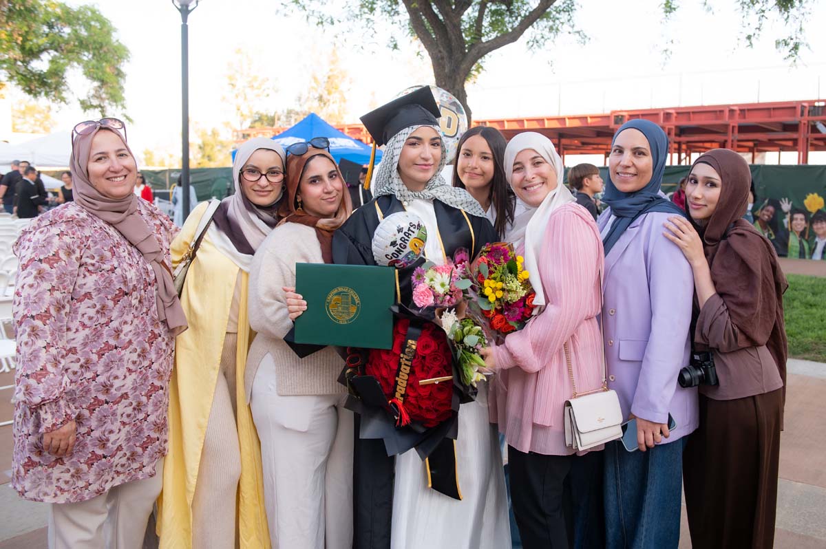 Grad with their family