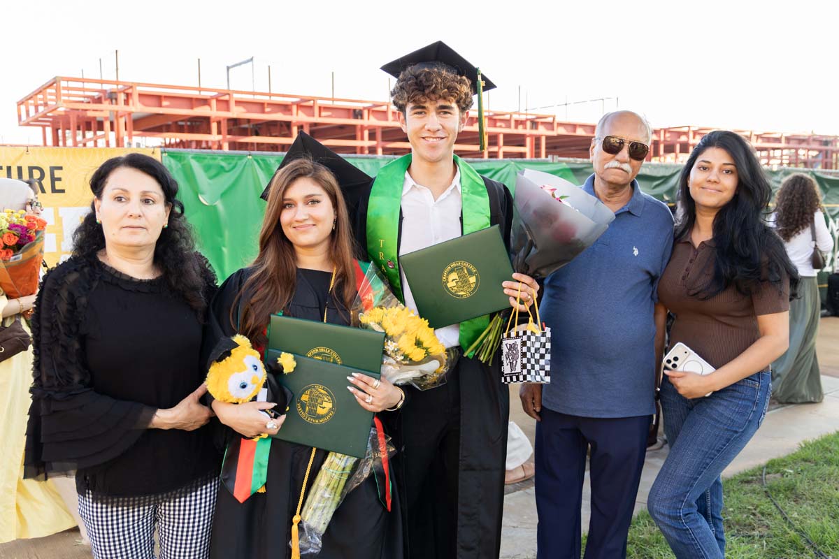 Grad with their family