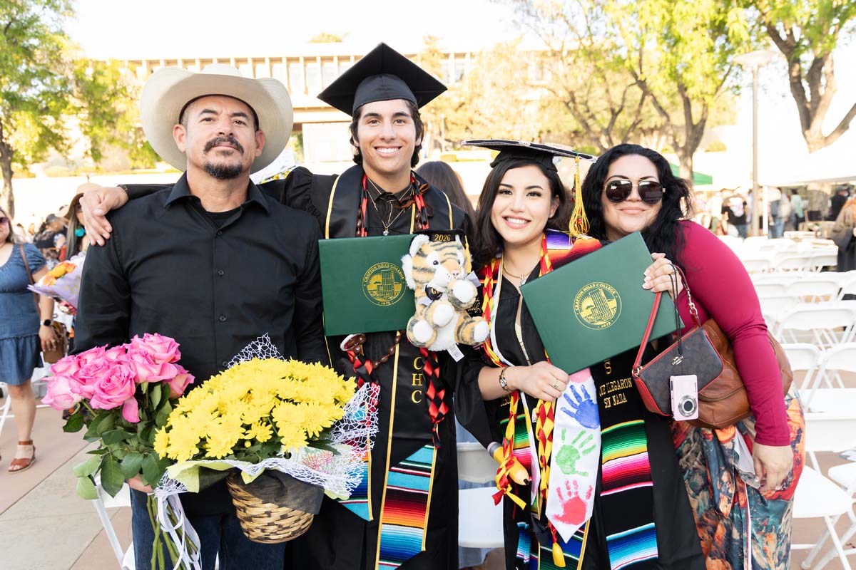 Grad with their family