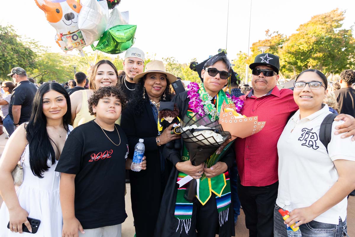 Grad with their family