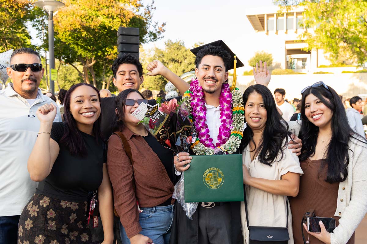 Grad with their family
