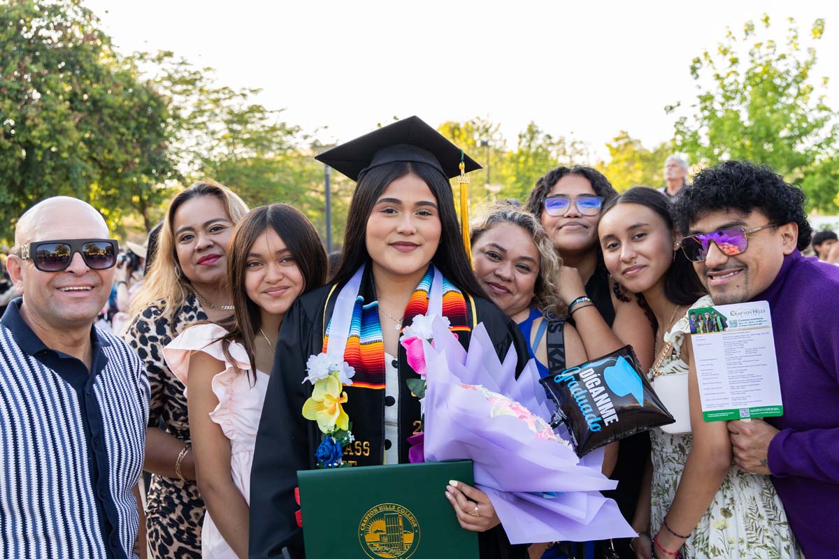 Grad with their family
