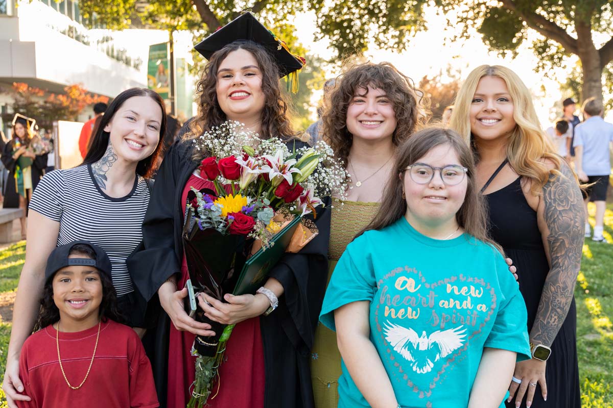 Grad with their family