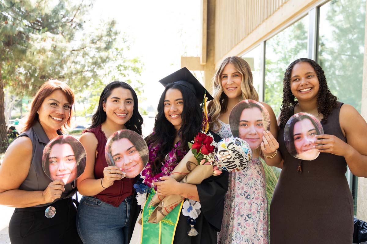 Grad with their family