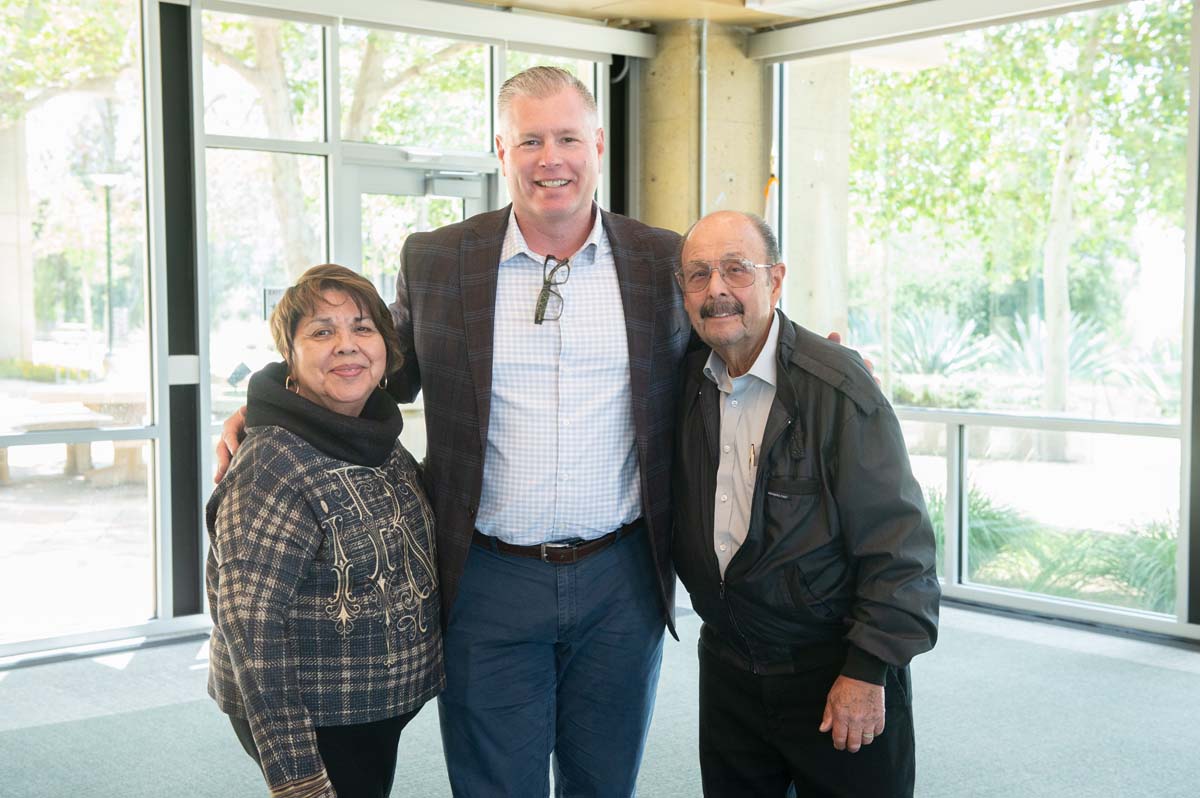 Two people with President