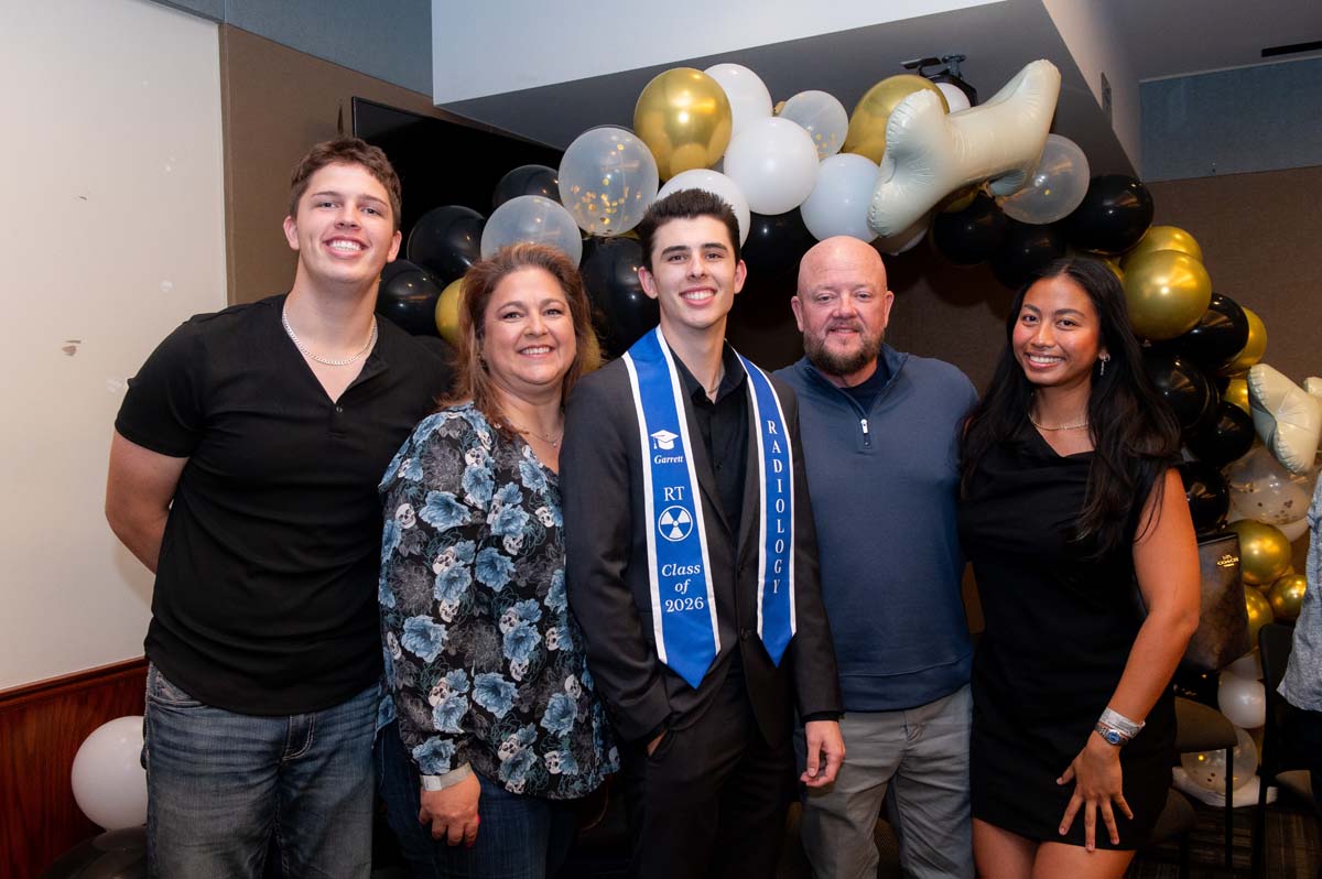 Grad with their family