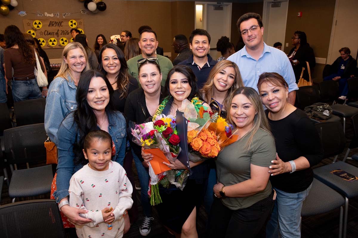 Grad with their family