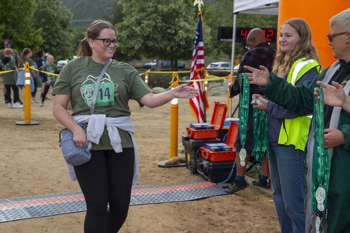 Racer being handed medal