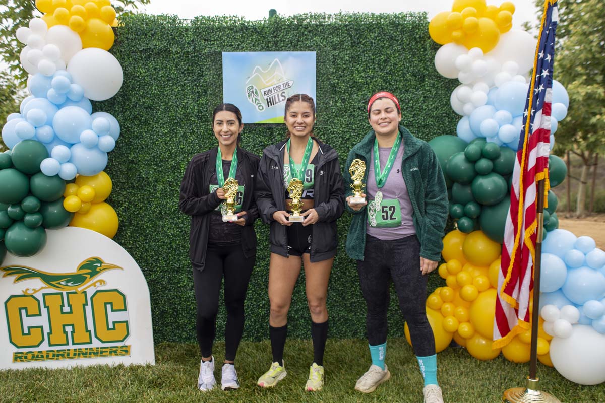Three racers wtih trophies