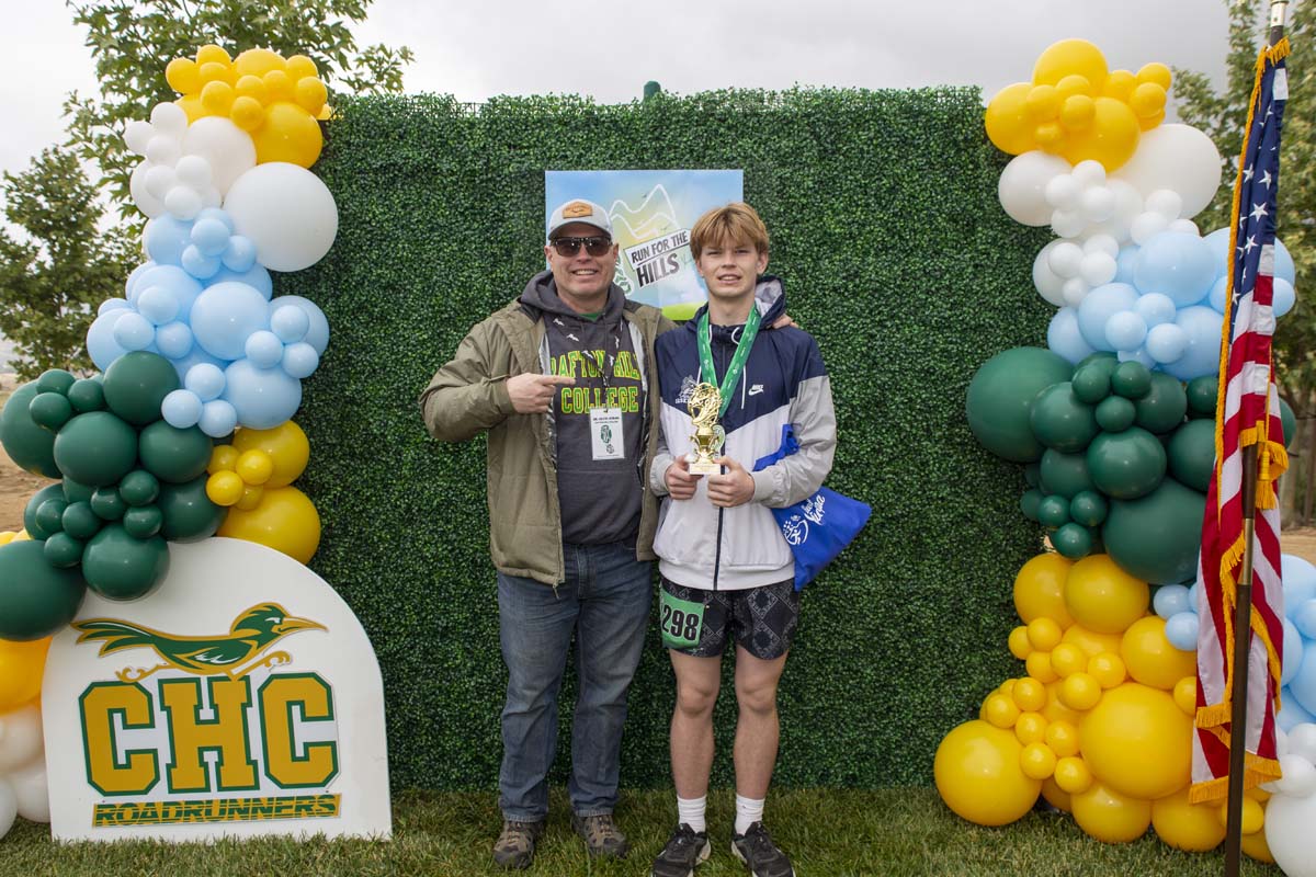 Crafton Presdient with racer who earned a trophy