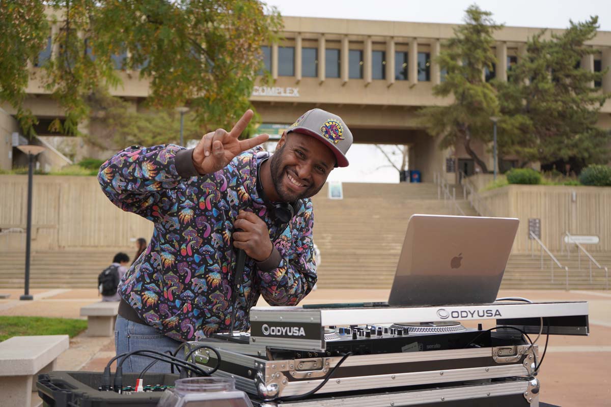 Students posing for a picture with food