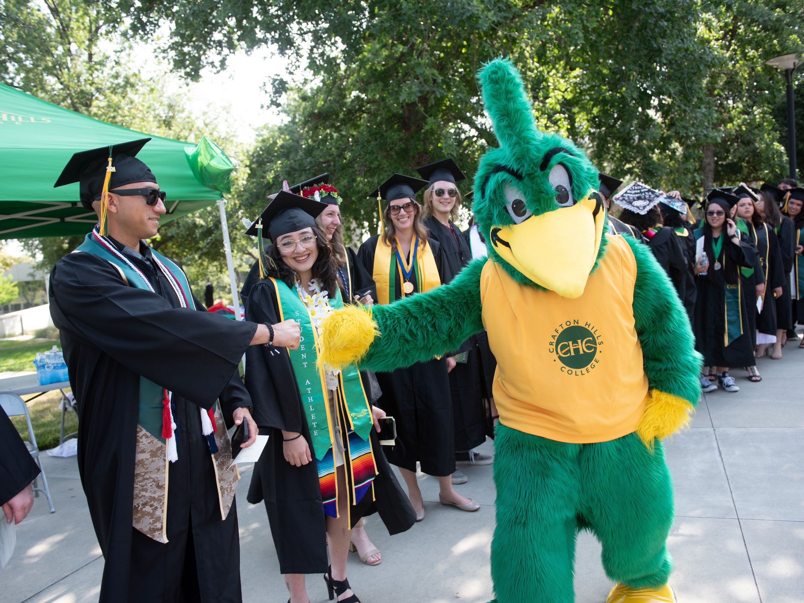 CHC Graduates with mascot Ryker
