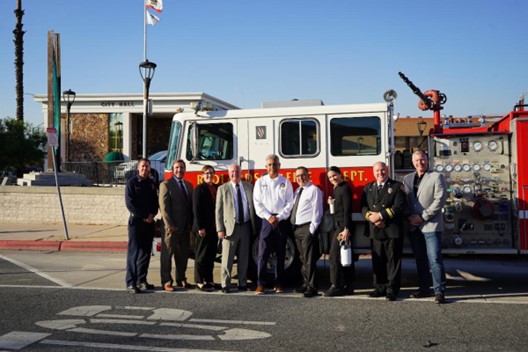 People in front of fire truck