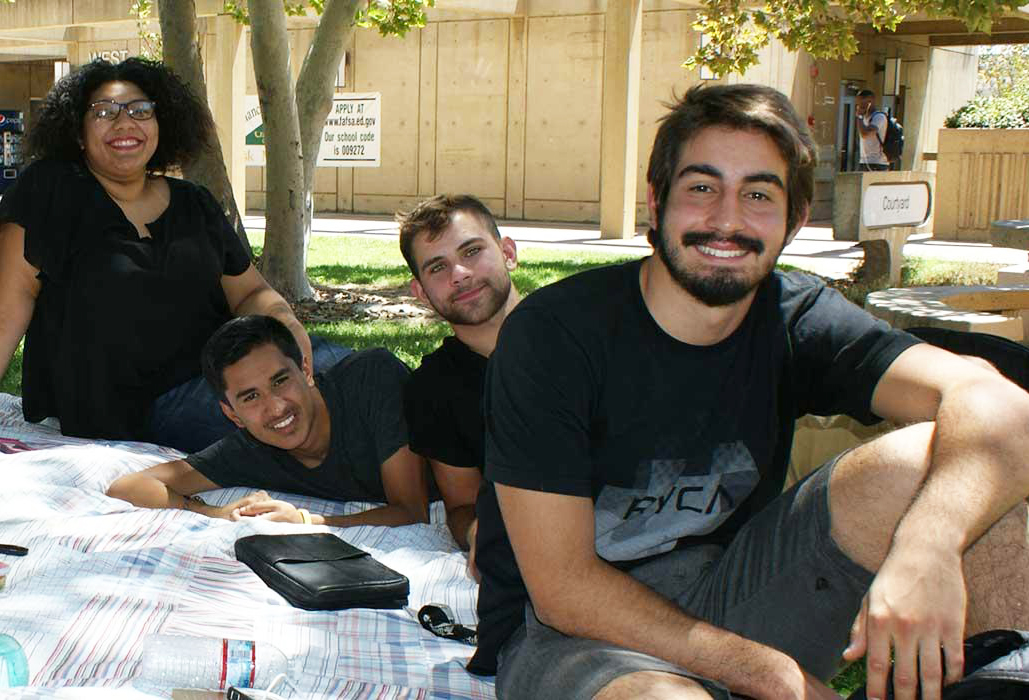 Students sitting on the grass