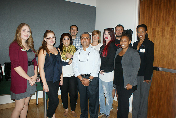 Group standing at grant presentation