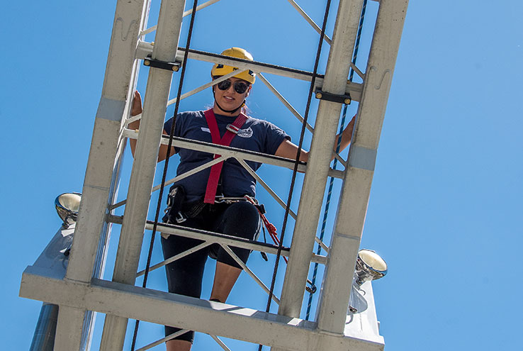 Woman on fire ladder