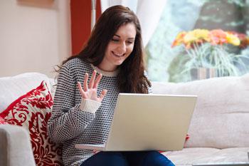  Girl sitting at laptop