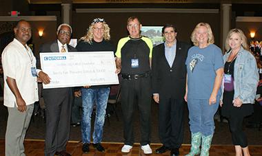 Kitchell check presentation at 2015 Gala.